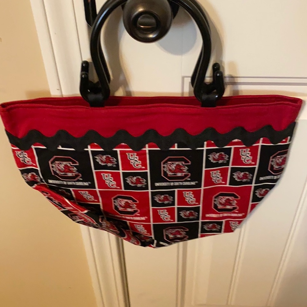 South Carolina, tote bag color red and black.